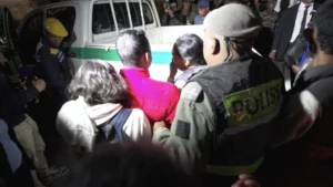 Video footage of a grieving family preparing to be taken home in Antananarivo on August 25, 2023, following a stampede in a stadium. © AFP