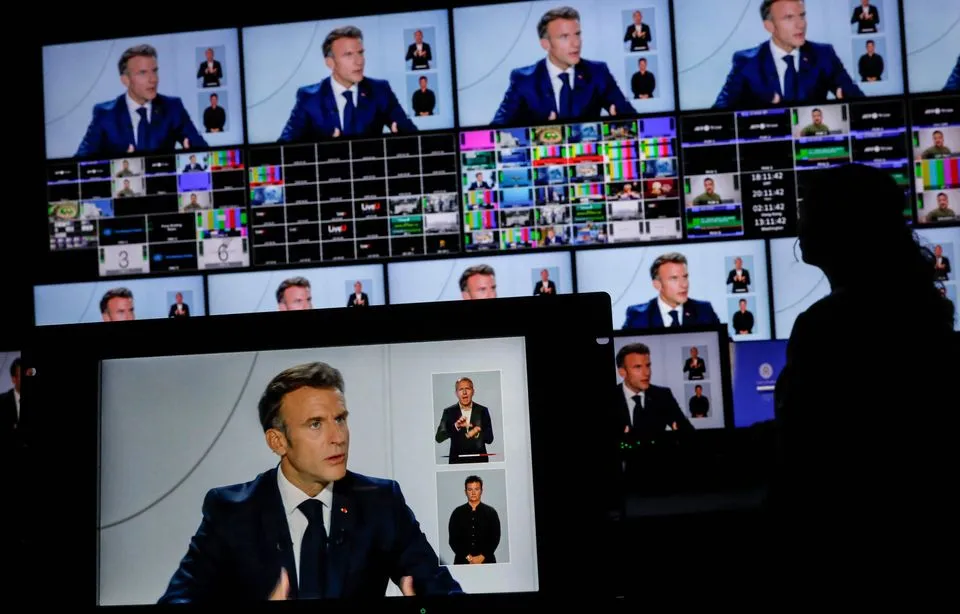 Emmanuel Macron during his interview on the 8 PM news programs of TF1 and France 2, on September 24, 2023. — Ian LANGSDON