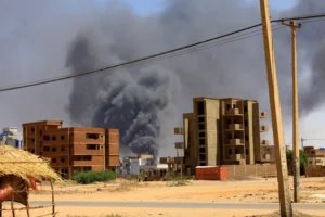 Smoke rises above buildings after an aerial bombardment during clashes between the paramilitary Rapid Support Forces and the army in Khartoum North, Sudan [File: Mohamed Nureldin Abdallah/Reuters]